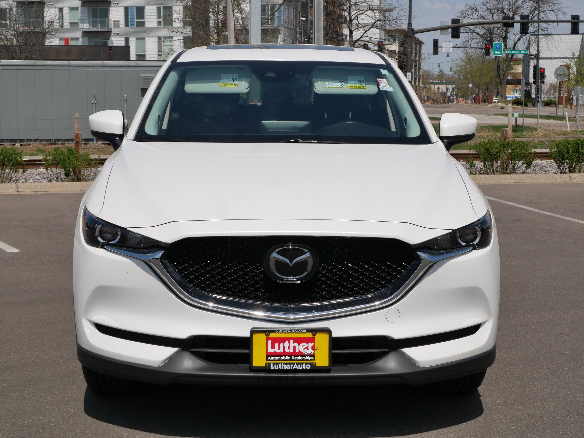 Used 2021 Mazda CX-5 Touring with VIN JM3KFBCM0M1324767 for sale in Hopkins, Minnesota