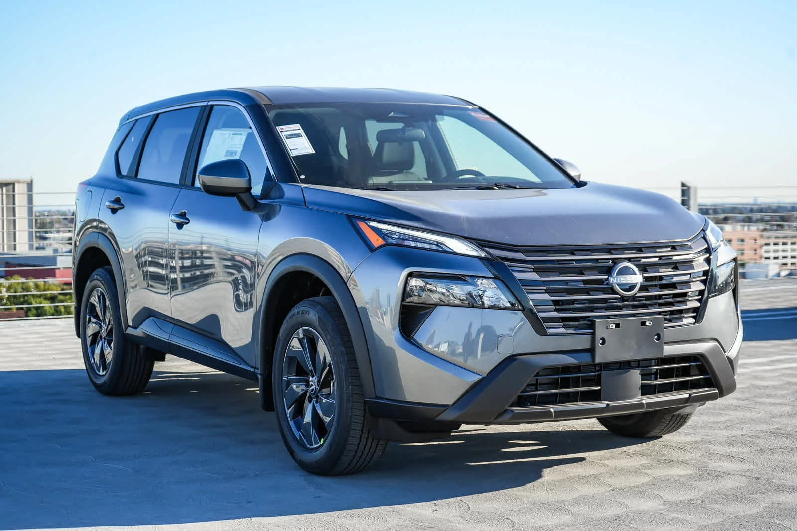 New 2026 Gun Metallic Nissan SV image 3