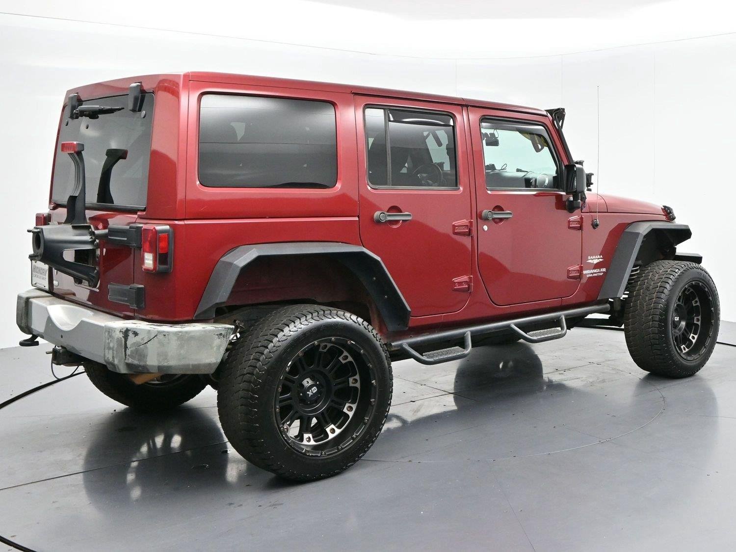 Used 2011 Deep Cherry Red Crystal Pearlcoat Jeep Sahara image 7