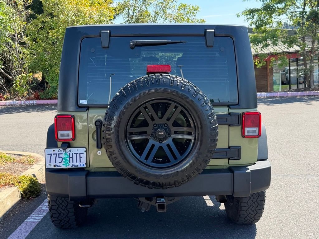 Used 2013 Commando Green Jeep Unlimited Sport image 5