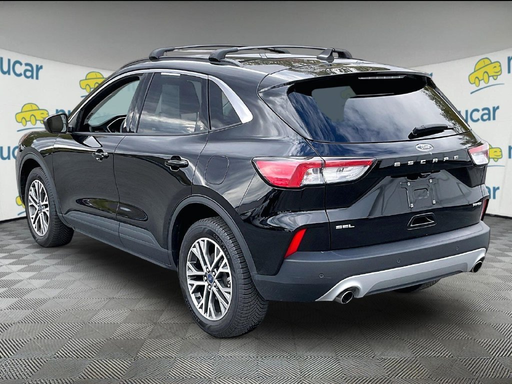 Used 2022 Black Metallic Ford SEL image 4