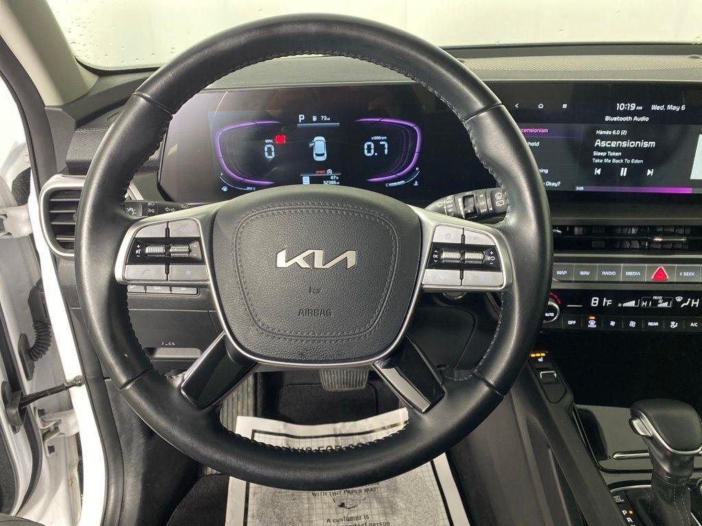 Used 2025 White Pearl Kia S image 16