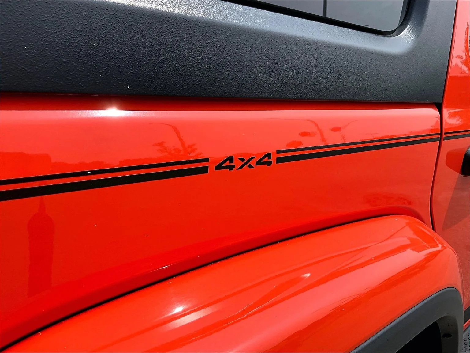 Used 2018 Orange Jeep Unlimited Sahara image 9