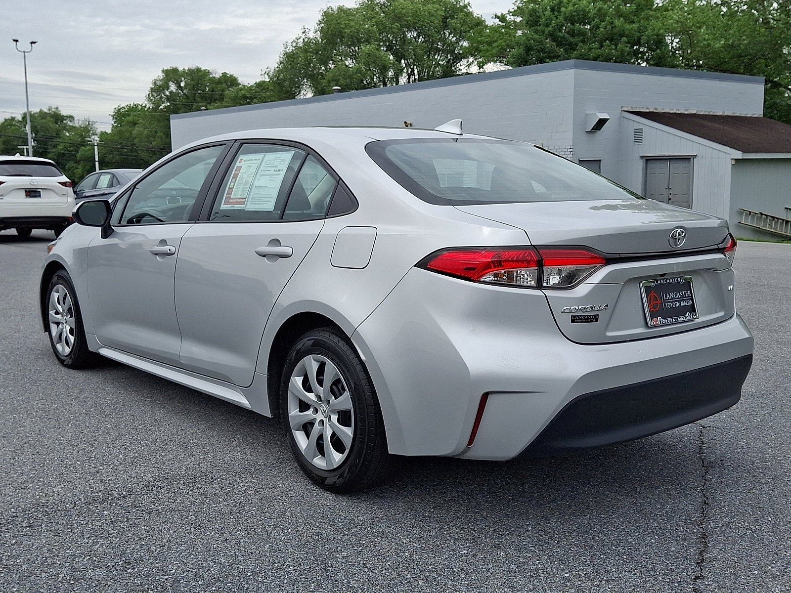 Used 2023 Classic Silver Metallic Toyota LE image 5