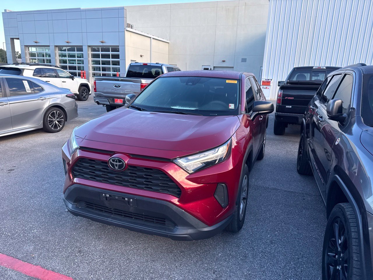 Used 2023 Red Toyota LE image 1