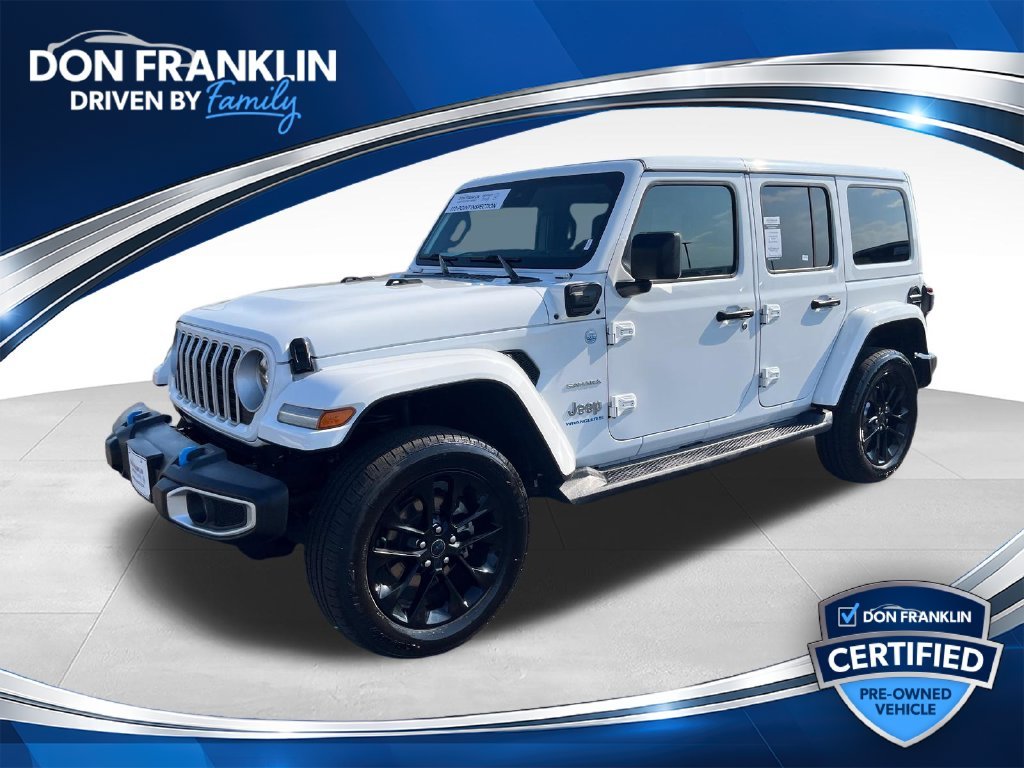 Used 2024 White Jeep Sahara 4xe image 1