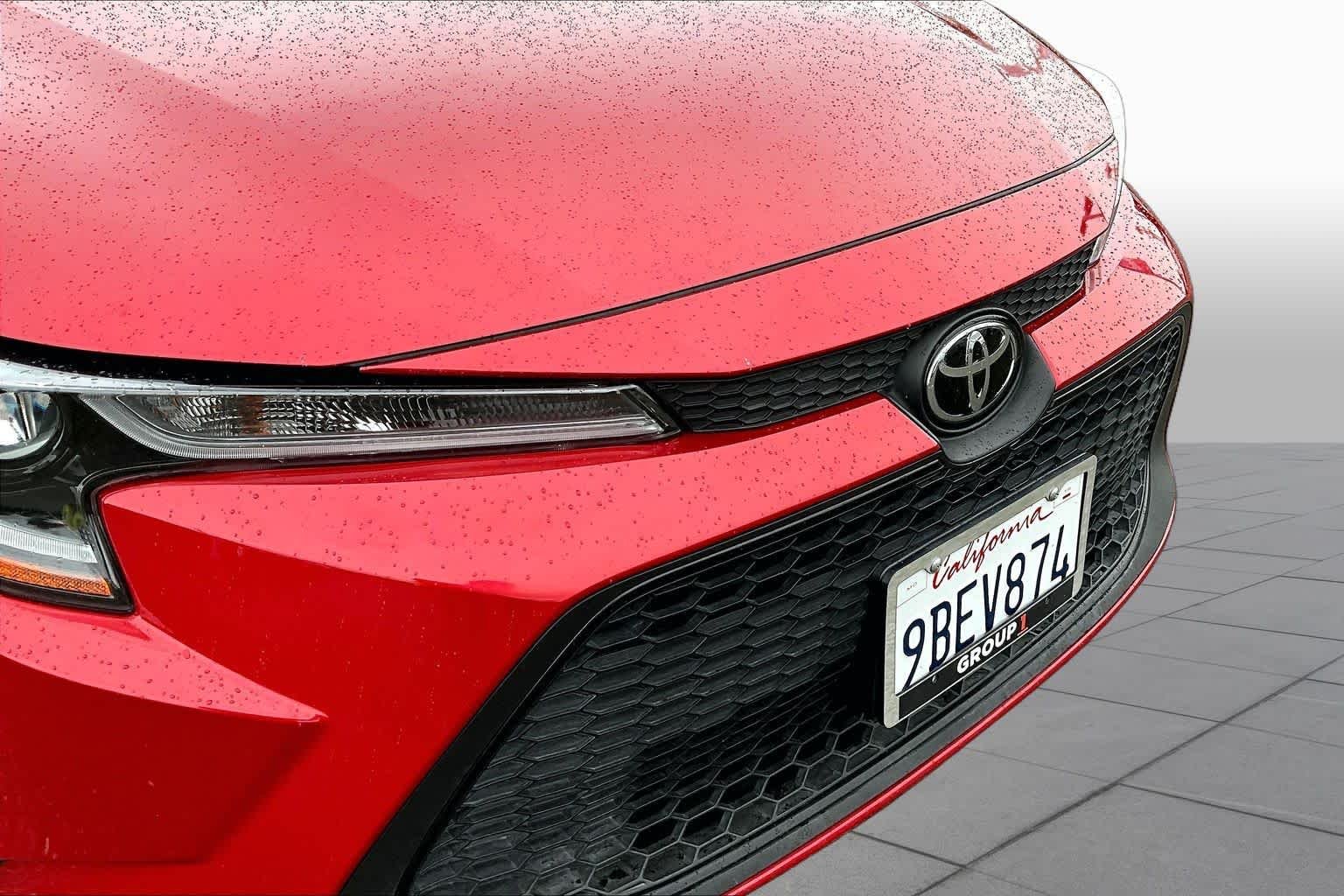 Used 2020 Barcelona Red Metallic Toyota LE image 29