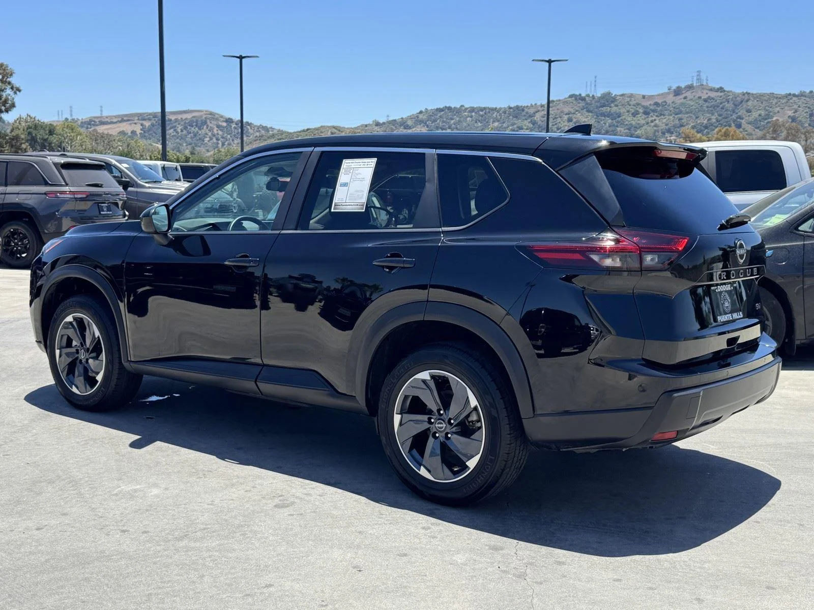 Used 2024 Super Black Nissan SV image 4