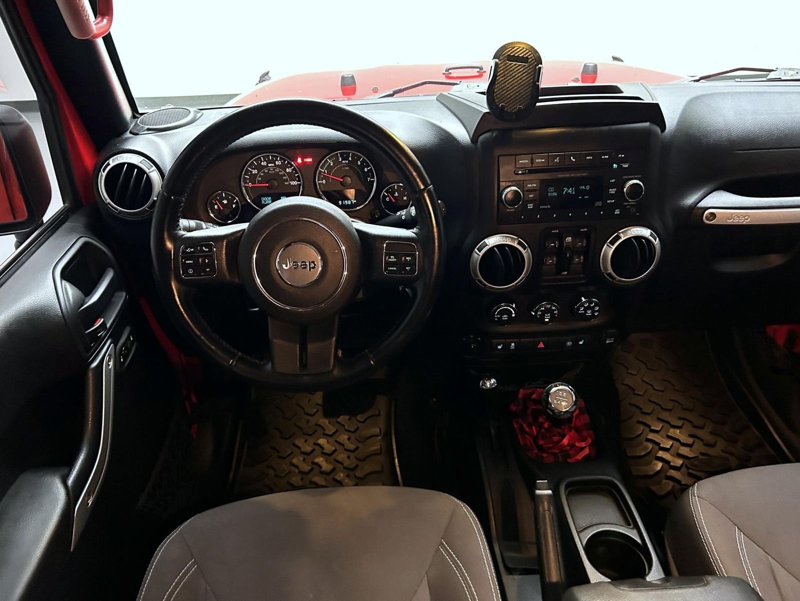 Used 2016 Red Jeep Unlimited Sahara image 14