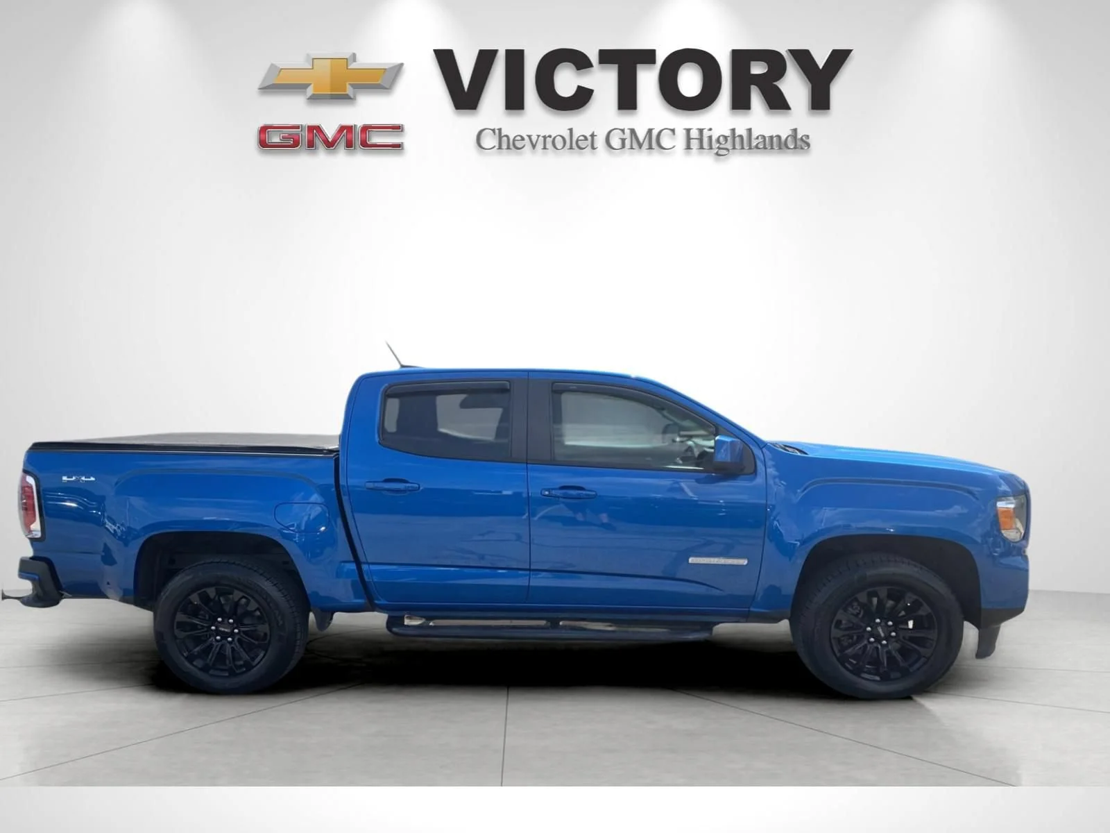 Used 2022 DYNAMIC BLUE METALLIC GMC 4WD Elevation image 2