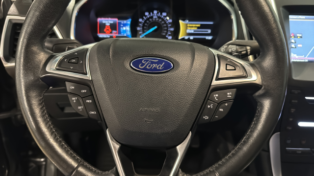 Used 2015 Magnetic Metallic Ford Titanium image 16