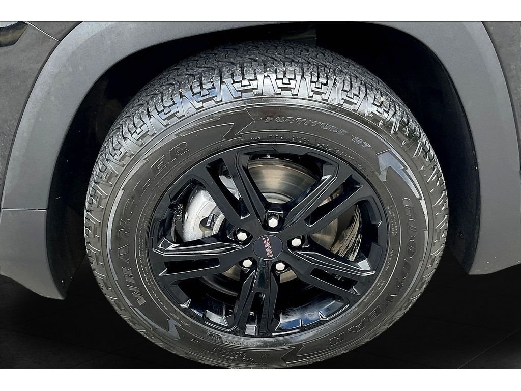 Used 2024 Ebony Twilight Metallic GMC AT4 image 7