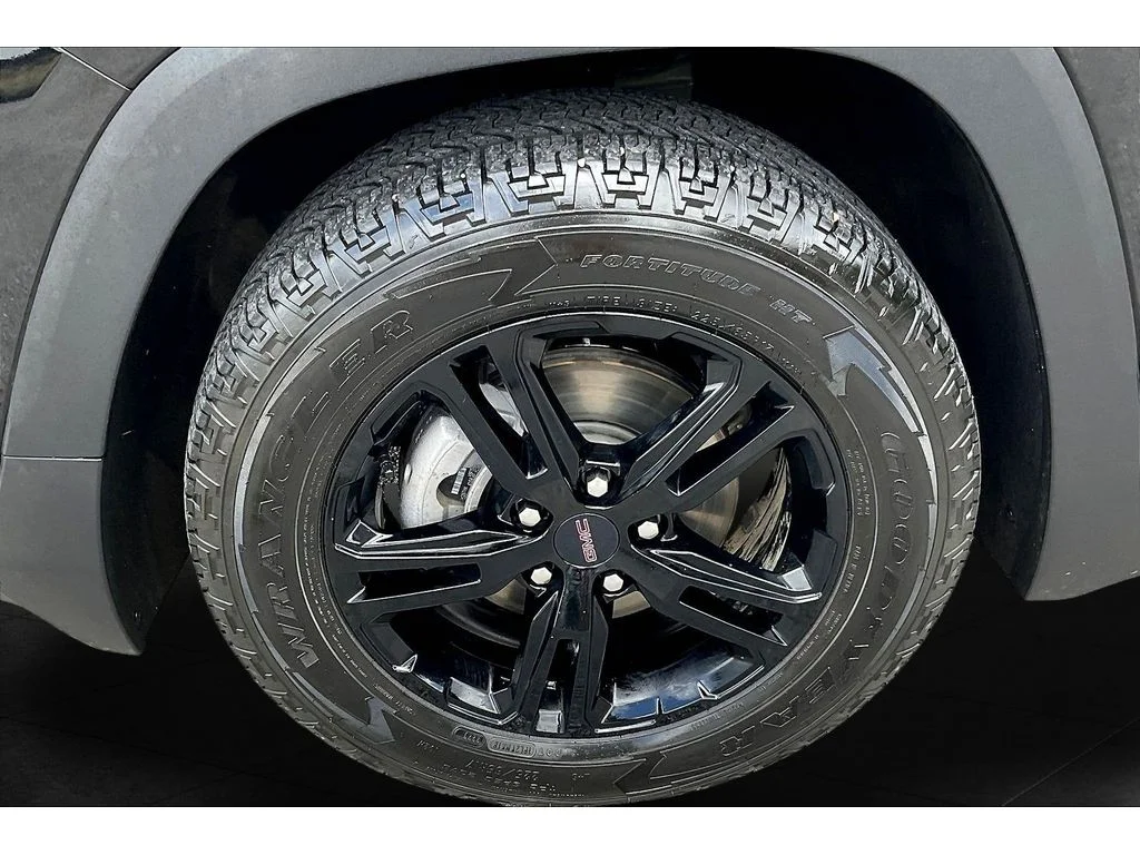 Used 2024 Ebony Twilight Metallic GMC AT4 image 7