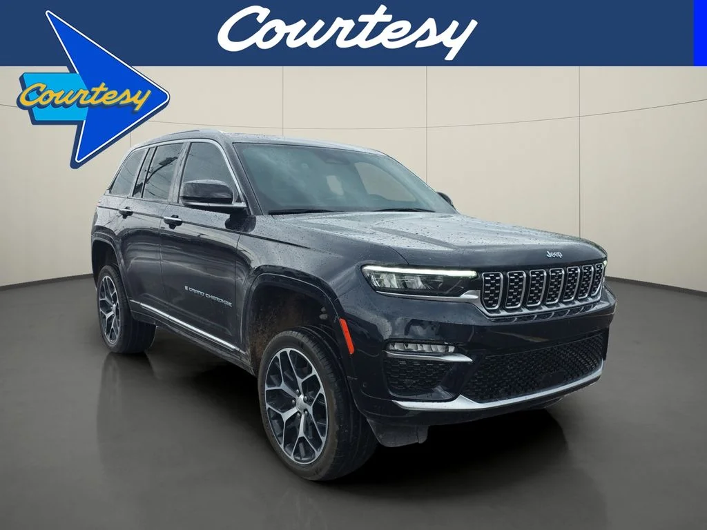 Used 2023 Black Jeep Summit Reserve 4xe image 1