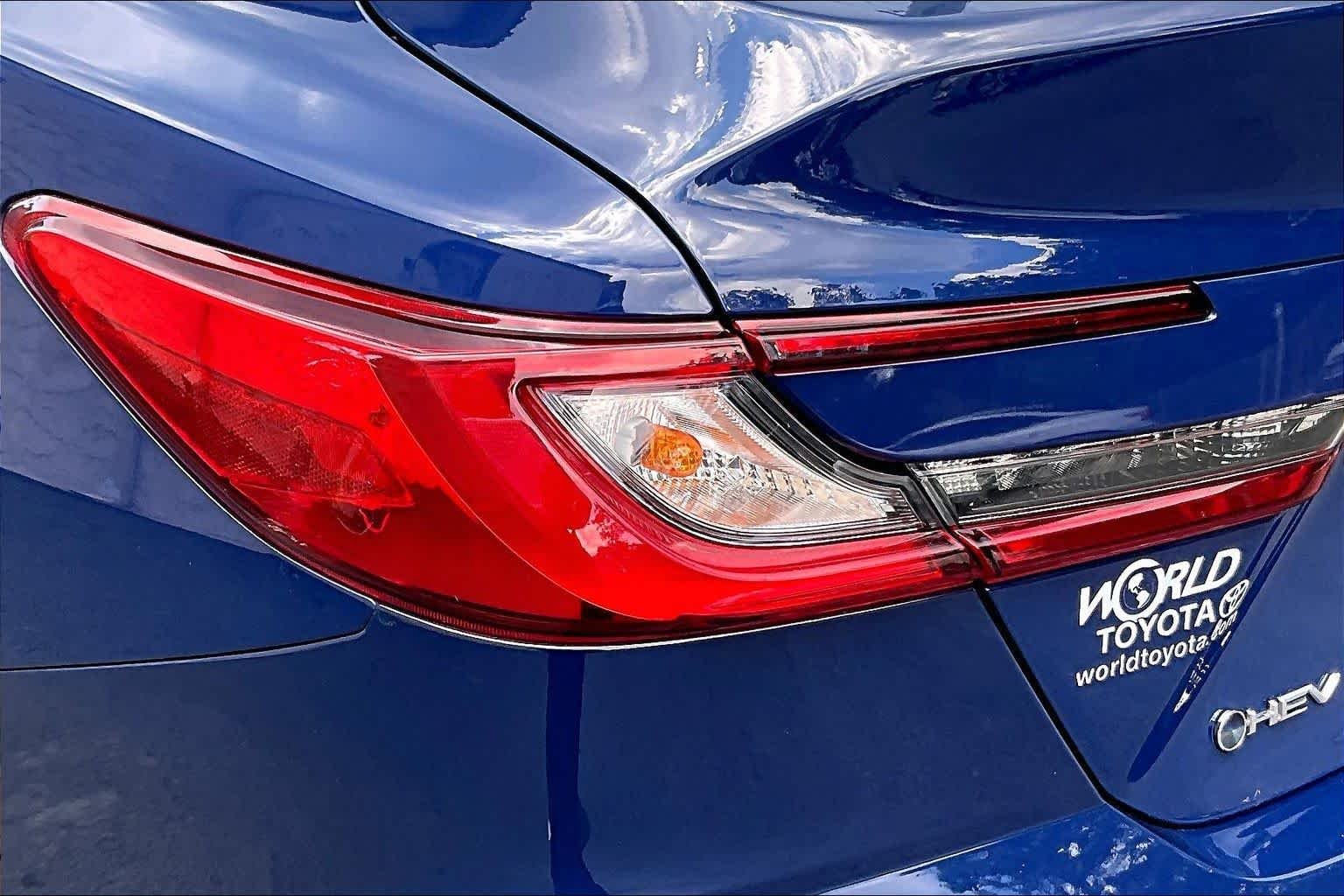 Used 2025 Reservoir Blue Toyota LE image 29