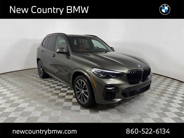 Used 2023 Green BMW xDrive40i image 1