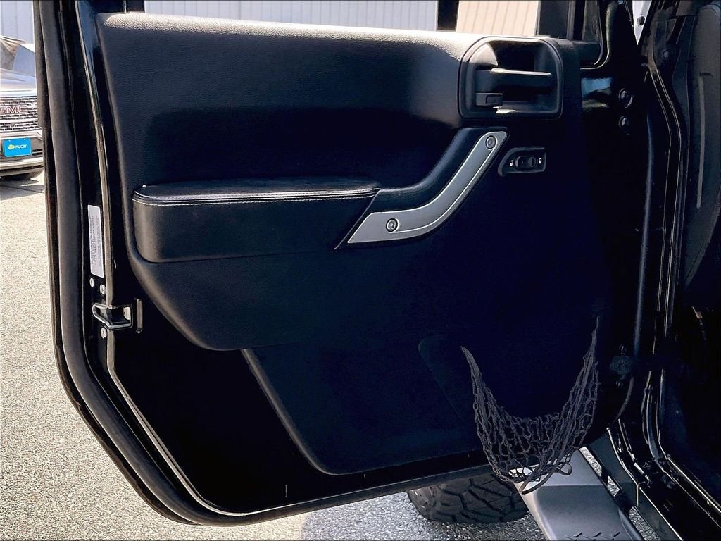 Used 2015 Black Jeep Unlimited Freedom Edition image 9