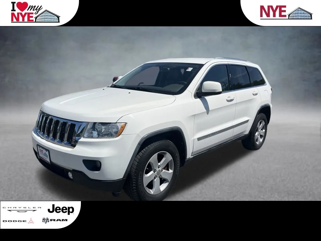 Used 2011 White Jeep Laredo image 1