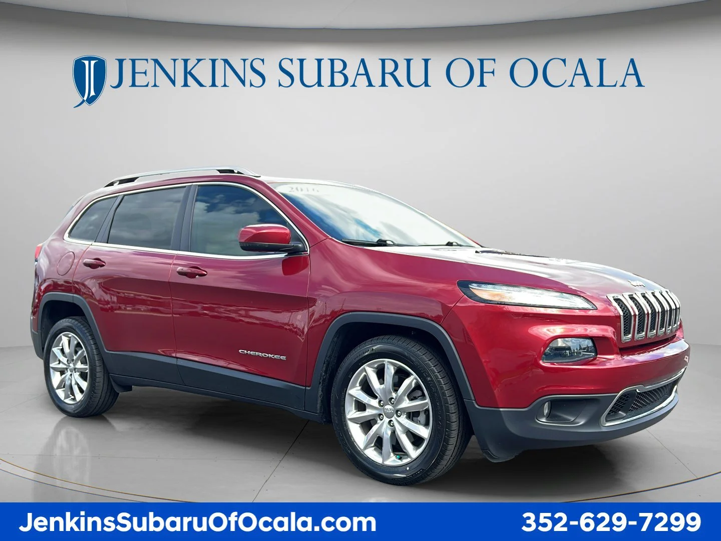 Used 2016 Deep Cherry Red Crystal Pearlcoat Jeep Limited image 1