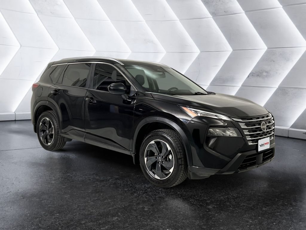 Used 2024 Black Nissan SV image 1