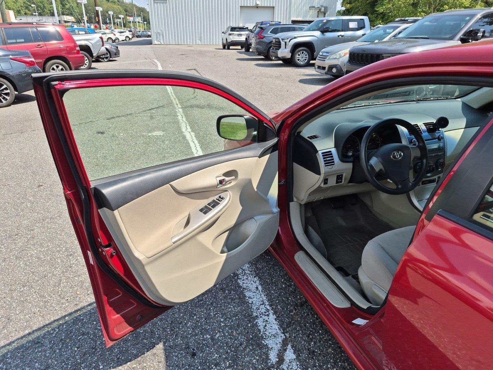 Used 2011 Barcelona Red Metallic Toyota LE image 14