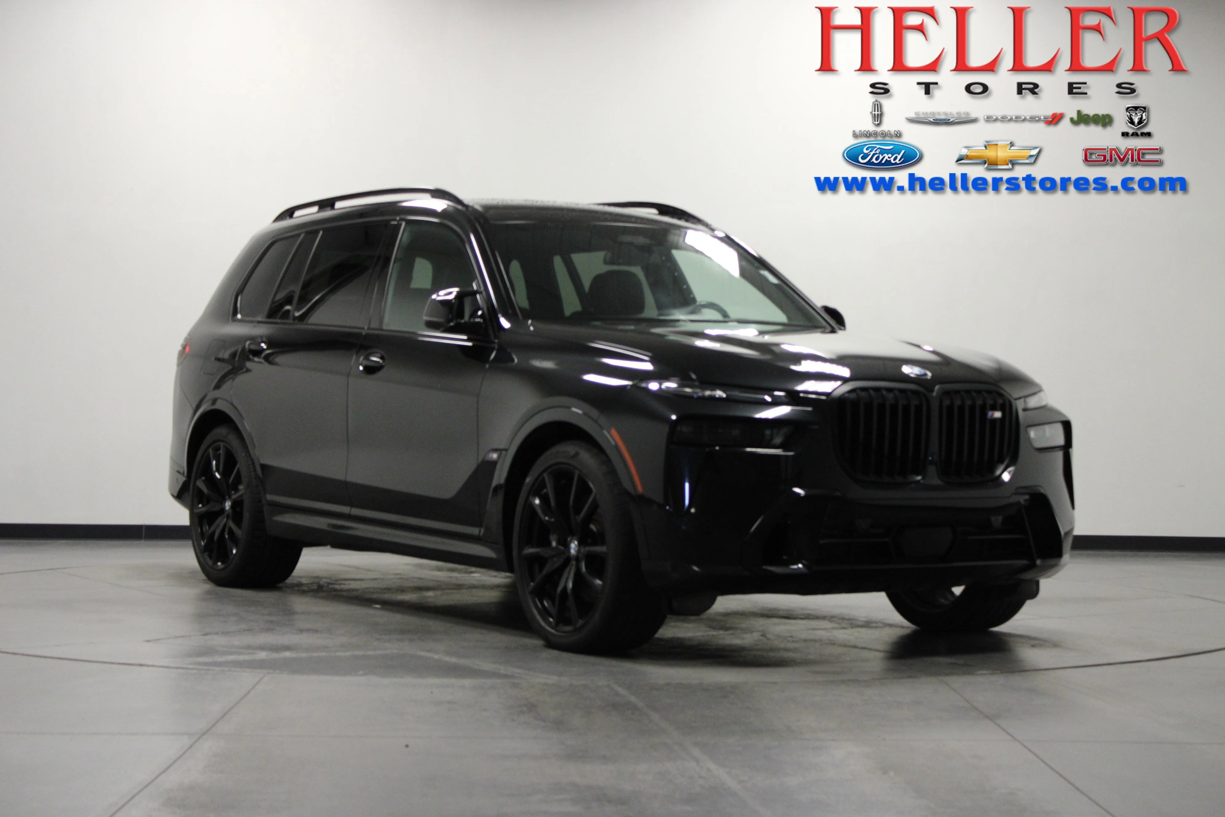 Used 2024 Black Sapphire Metallic BMW M60i image 1
