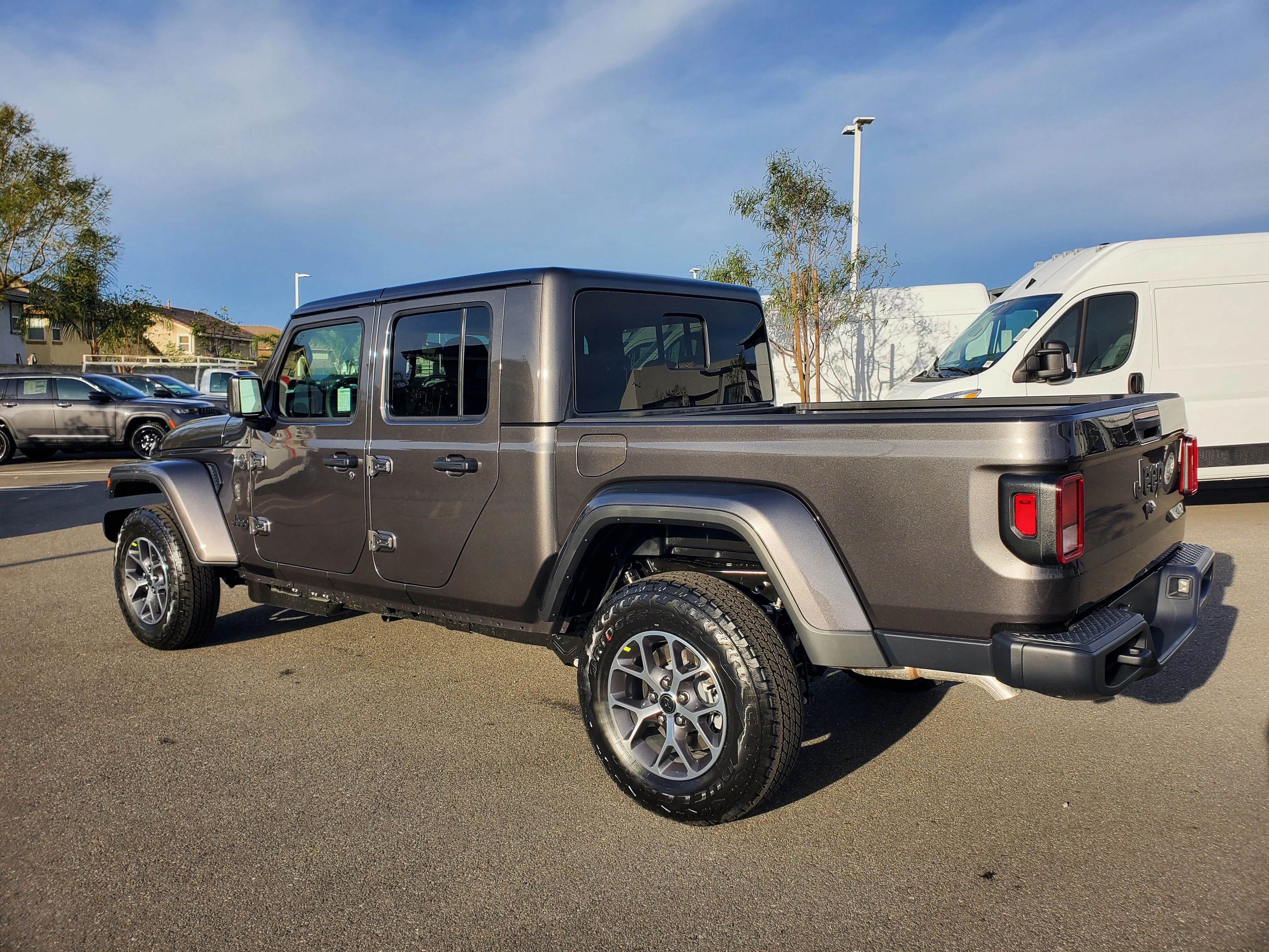 New 2026 Granite Crystal Metallic Clear-Coat Exterior Paint Jeep Sport S image 2