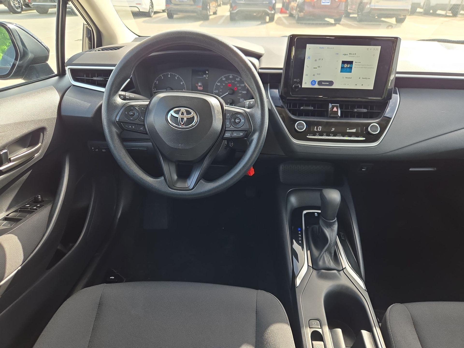 Used 2025 Midnight Black Metallic Toyota LE image 26