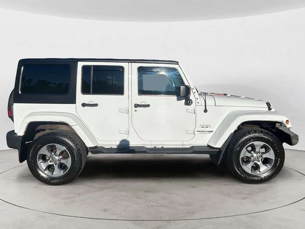Used 2018 Bright White Jeep Unlimited Sahara 4x4 image 7