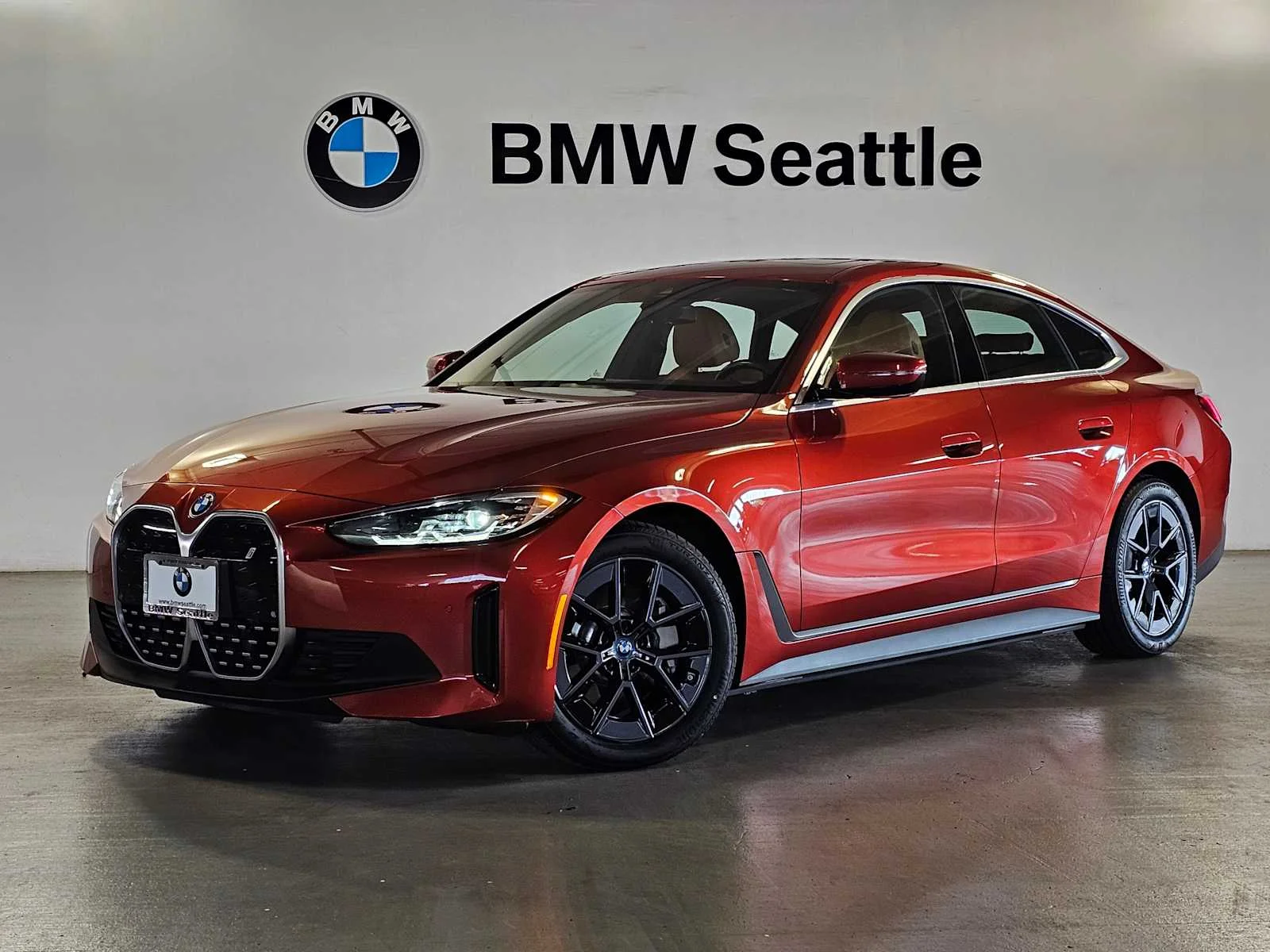 Certified Used 2023 Sunset Orange Metallic BMW eDrive35 image 1