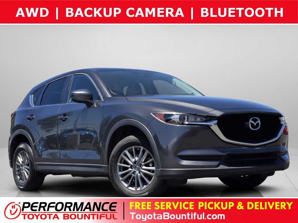 Used 2017 Machine Gray Metallic Mazda Touring image 1