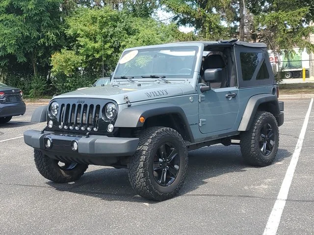 Used 2015 Gray Jeep Sport image 2