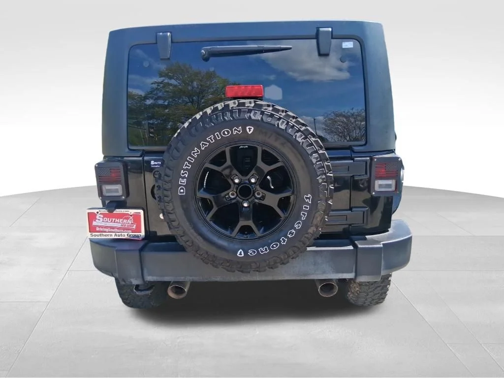 Used 2016 Black Jeep Unlimited Sport image 4