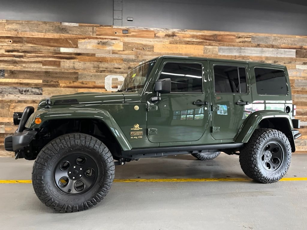 Used 2014 Black Clearcoat Jeep Unlimited Rubicon image 16