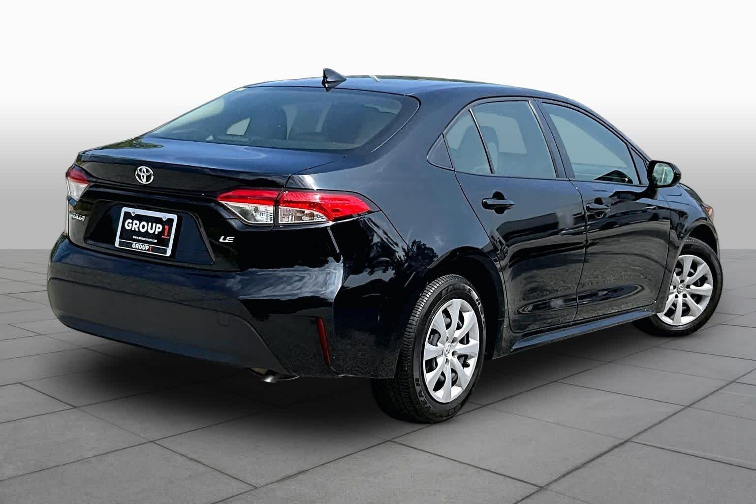 Used 2024 Midnight Black Metallic Toyota LE image 25