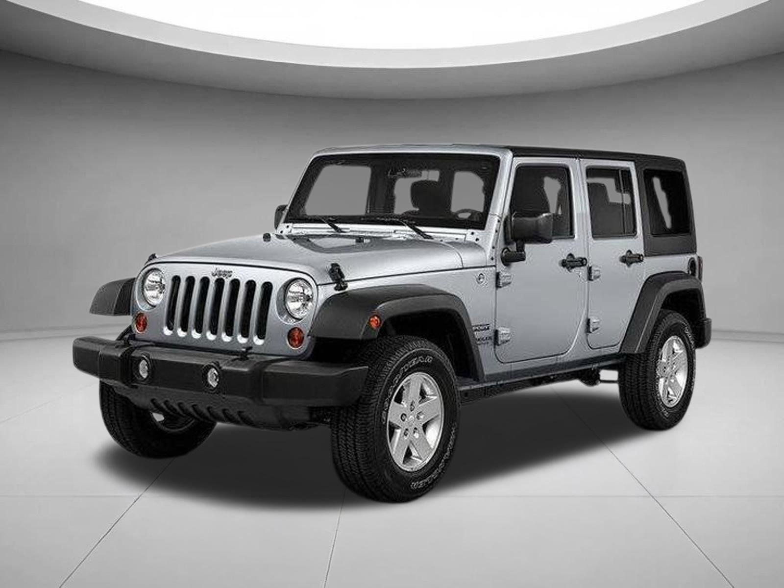 Used 2016 Black Clearcoat Jeep Sport image 1