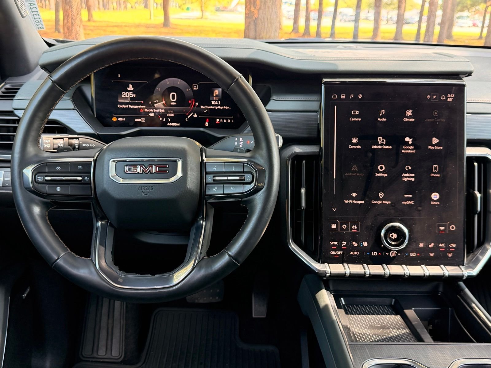 Used 2024 Ebony Twilight Metallic GMC AT4 image 3