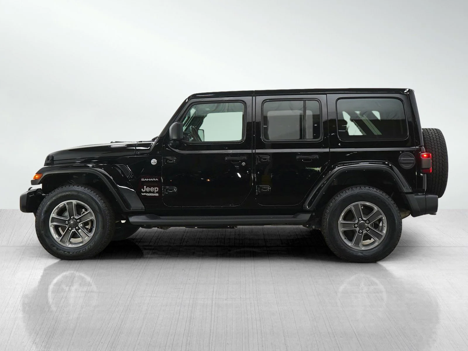 Used 2021 Jeep Wrangler Unlimited Sahara with VIN 1C4HJXEG0MW870980 for sale in Hopkins, Minnesota