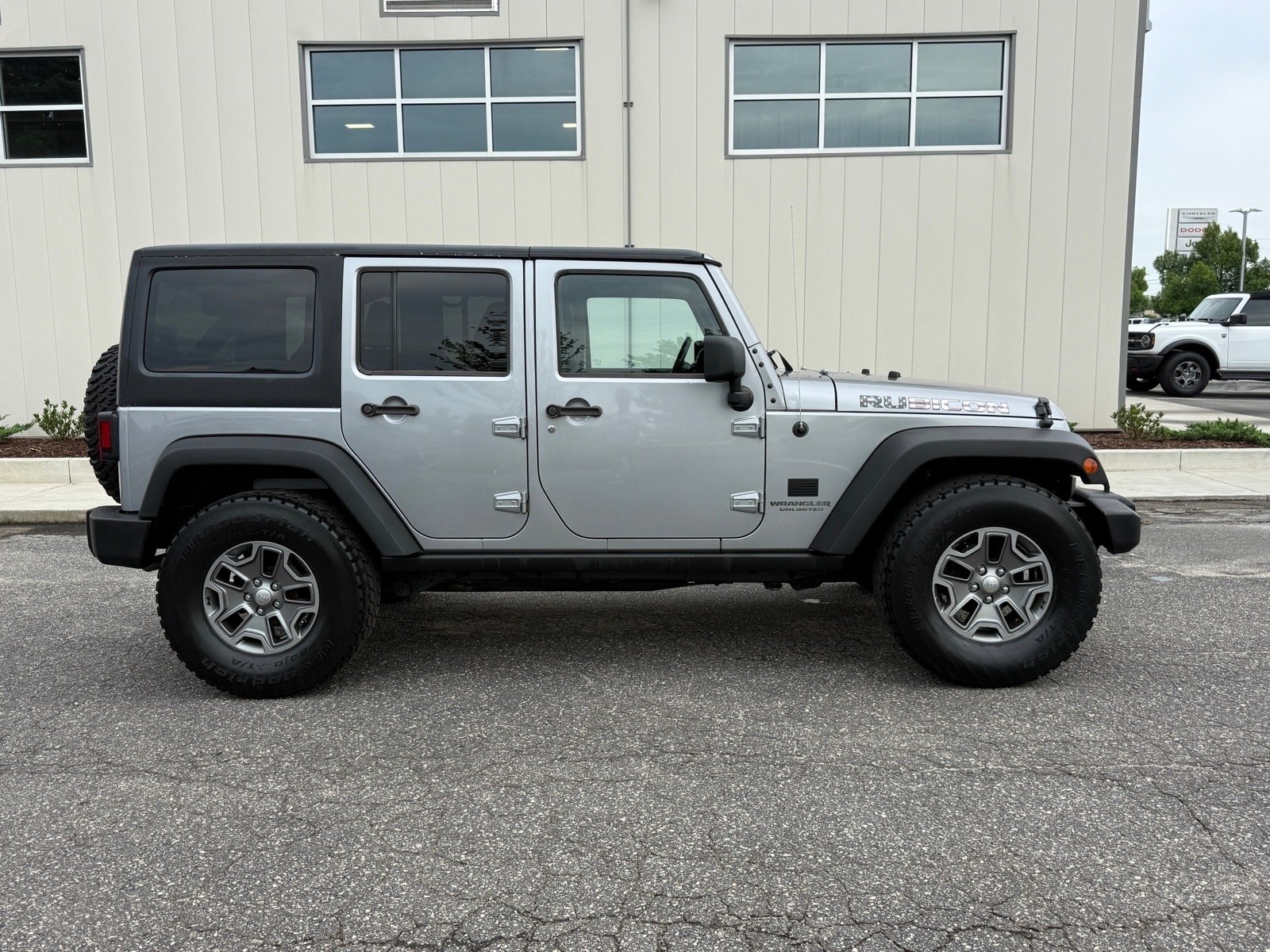 Used 2014 Billet Silver Metallic Clear Coat Jeep Rubicon image 2