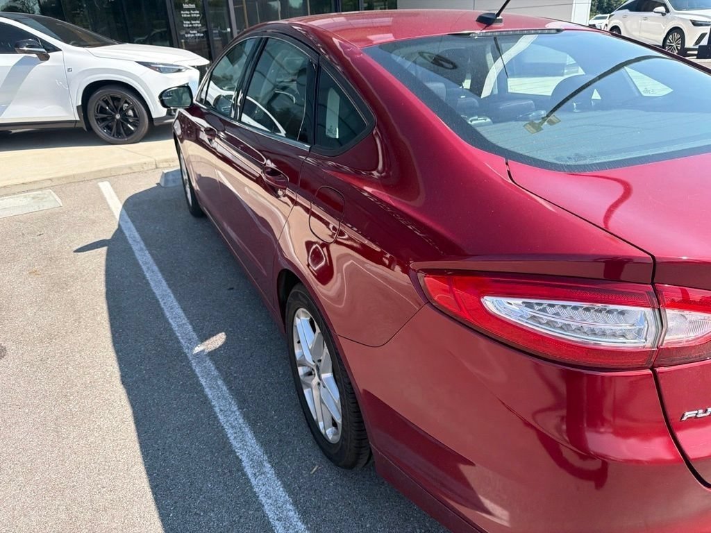 Used 2013 Ruby Red Metallic Ford SE image 12