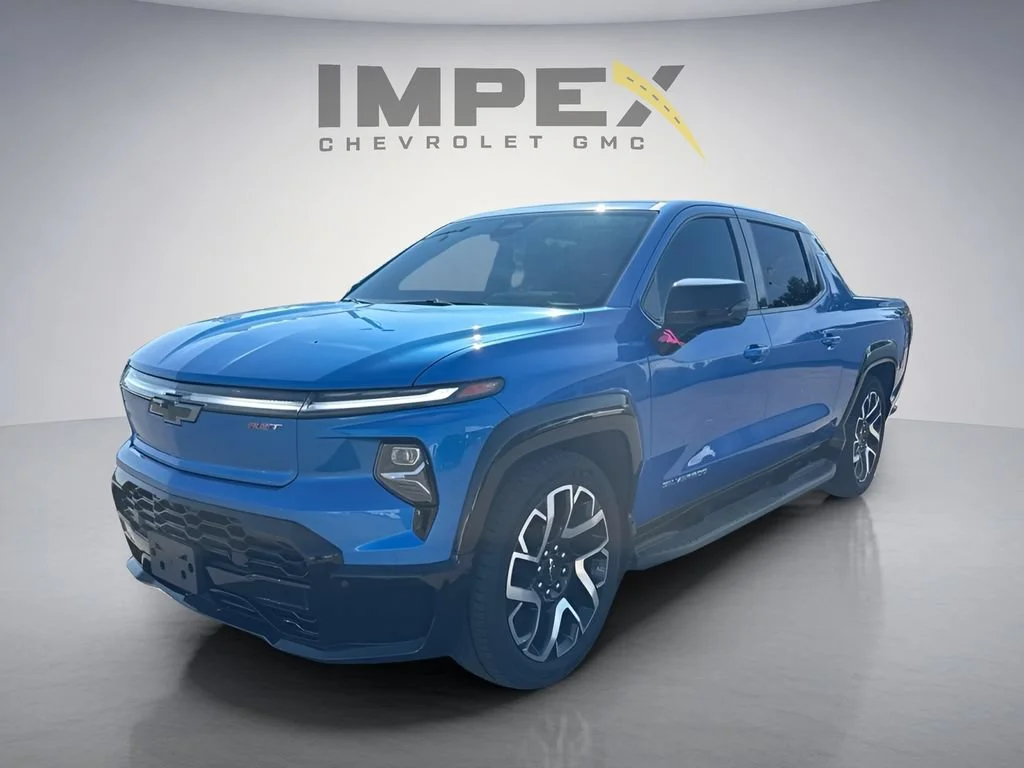 Used 2025 Riptide Blue Metallic Chevrolet RST - Max Range image 1
