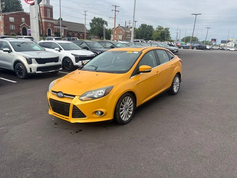 Used 2012 Yellow Ford Titanium image 3