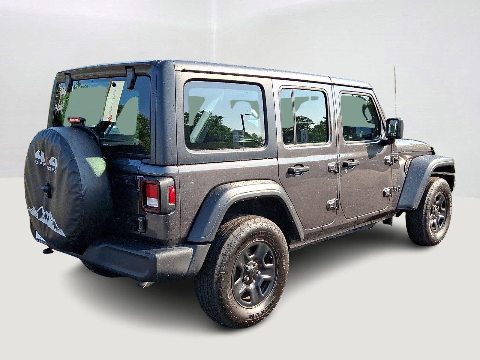 Used 2022 Granite Crystal Metallic Clearcoat Jeep Unlimited Sport image 6