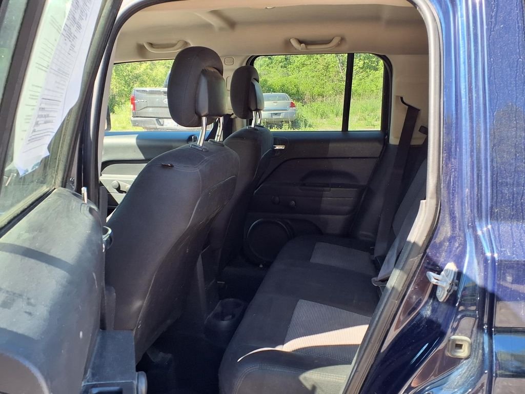 Used 2014 Blue Jeep Sport image 9