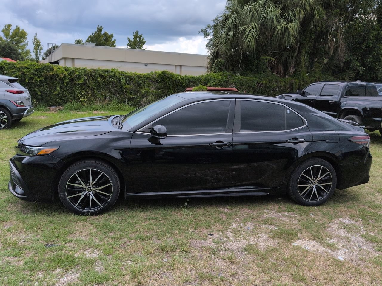 Used 2023 Midnight Black Metallic Toyota SE image 5