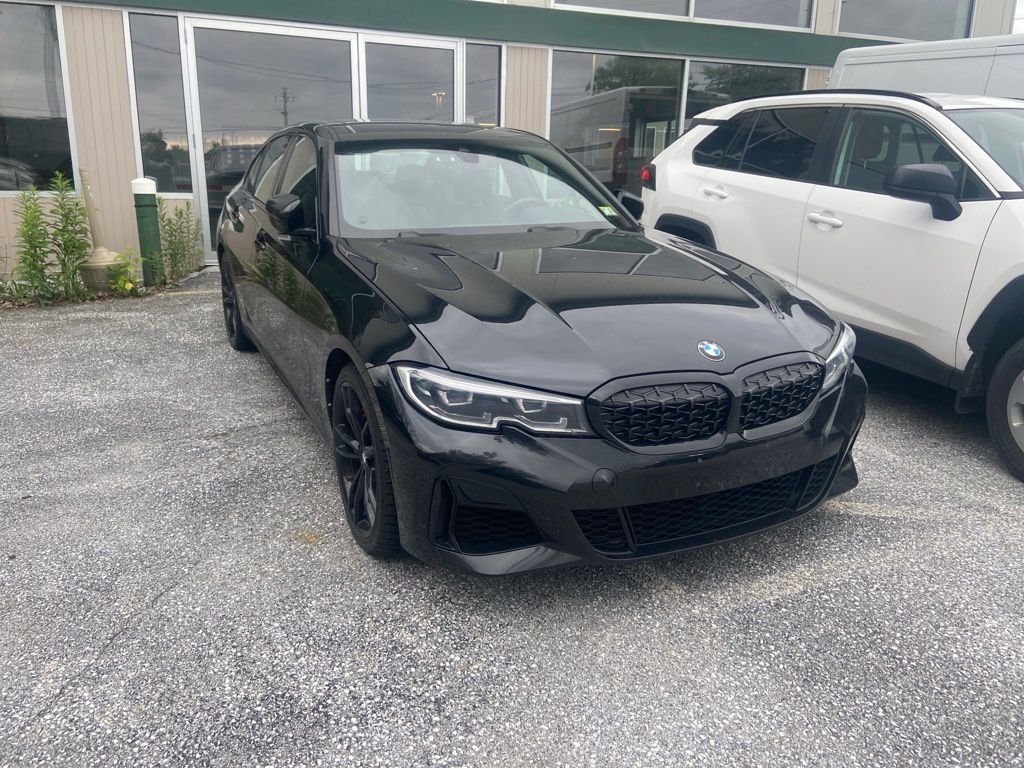 Used 2021 Black Sapphire Metallic BMW M340i xDrive image 1