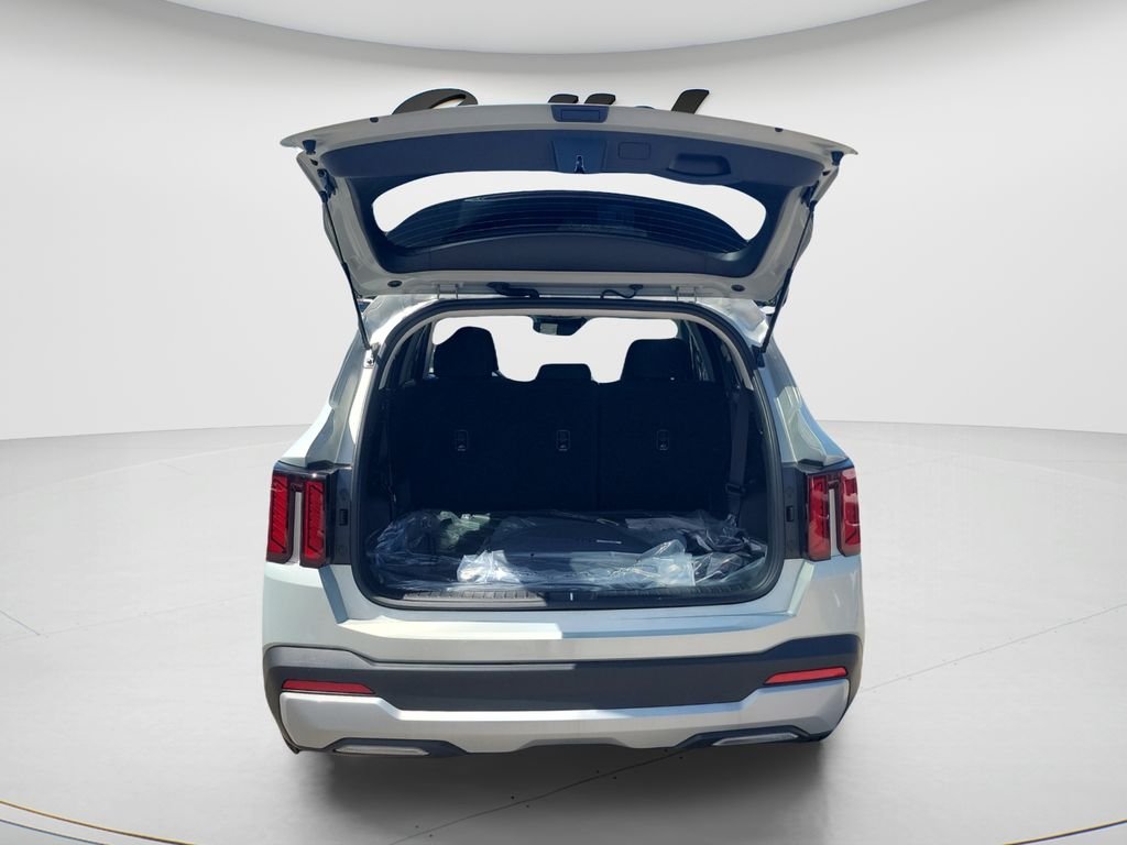 New 2026 Ivory Silver Kia LX image 9