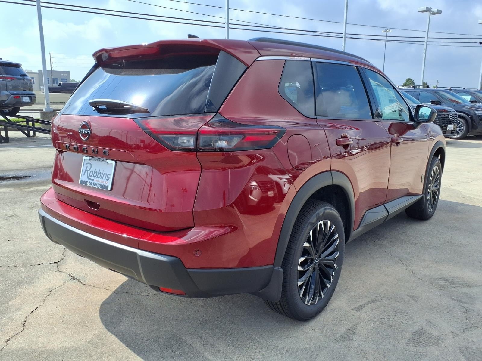 New 2026 Scarlet Ember Tintcoat Nissan Dark Armor image 2