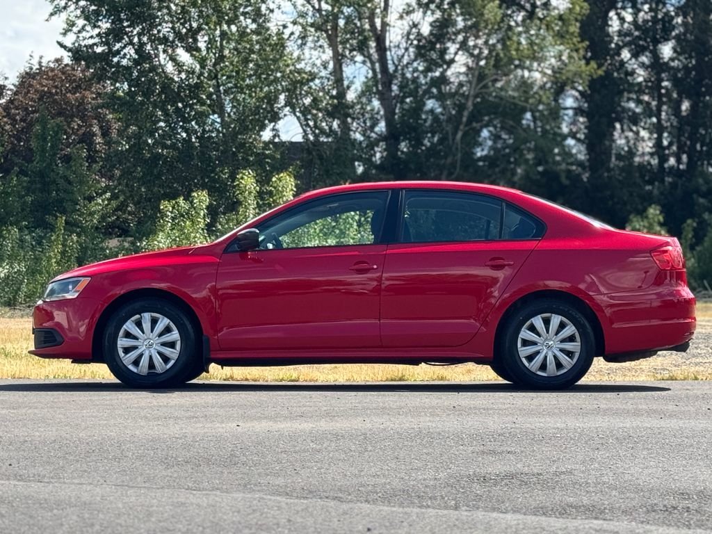 Used 2014 Tornado Red Volkswagen 2.0L S image 4