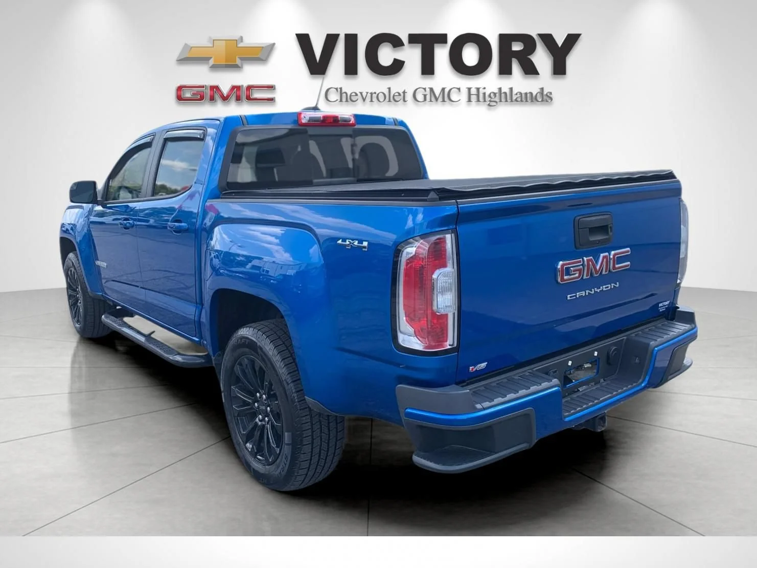 Used 2022 DYNAMIC BLUE METALLIC GMC 4WD Elevation image 5